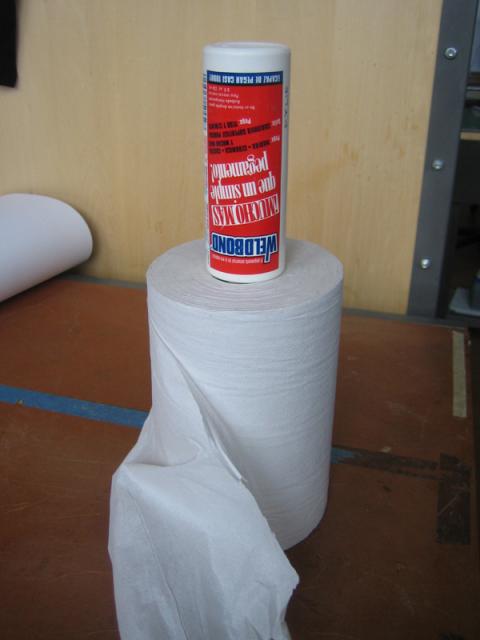 glue bottle in paper towel