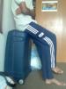 Sitting on a suitcase: When we become tired and there is no place to sit we tend to lean on suitcases